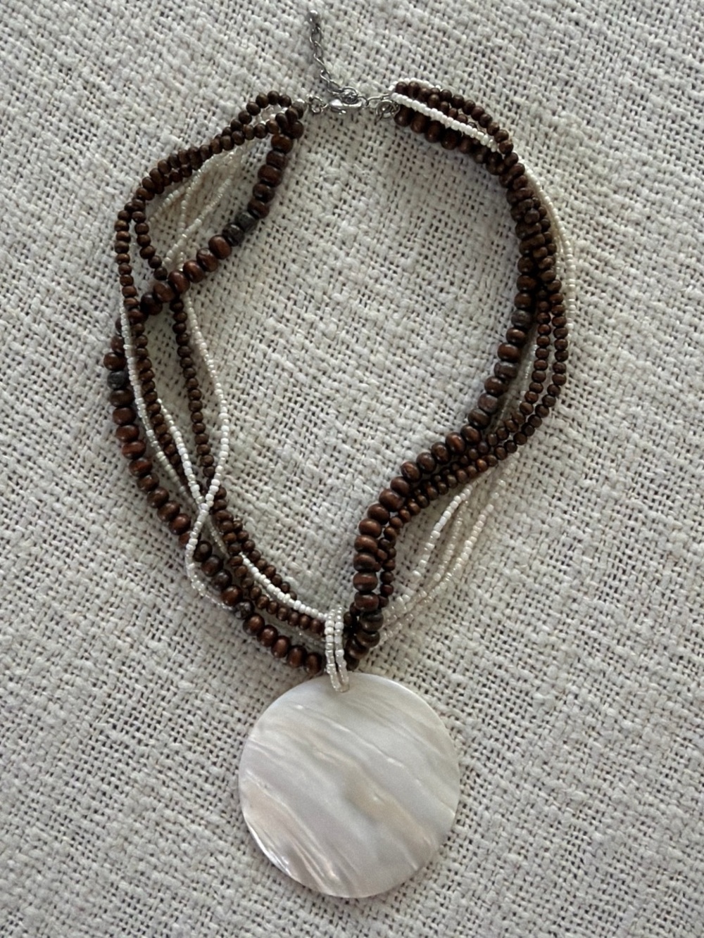 Multi-Strand Brown Beaded Necklace with White Mother-of-Pearl Pendant
